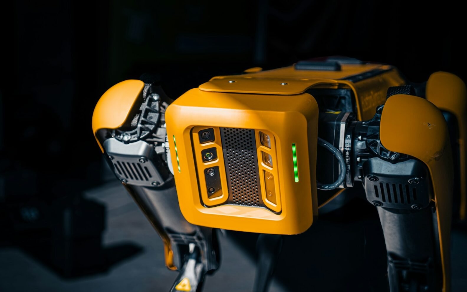 a close up of a robot that is yellow